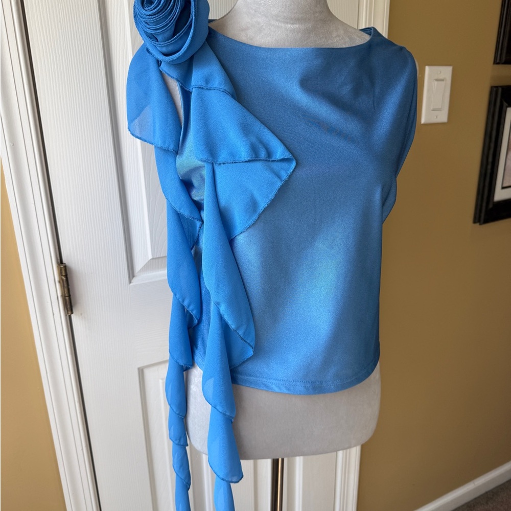 Elegant Blue Sleeveless Top with Floral Detail